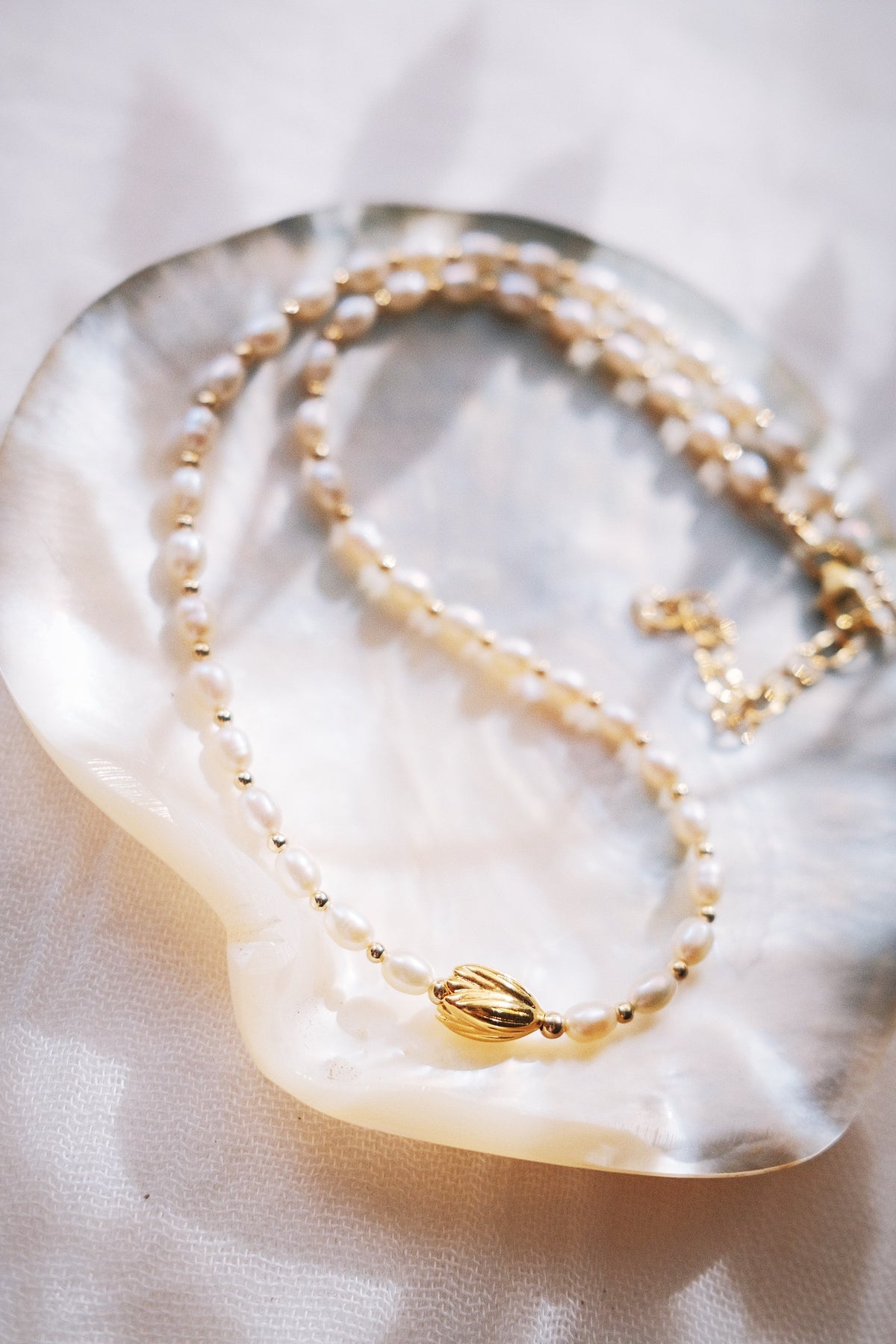 White Freshwater Pearl Necklace with Gold Pikake Bead - Pōhina