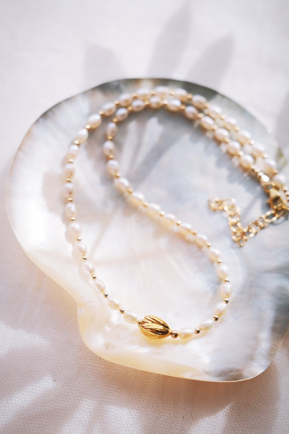 White Freshwater Pearl Necklace with Gold Pikake Bead - Pōhina