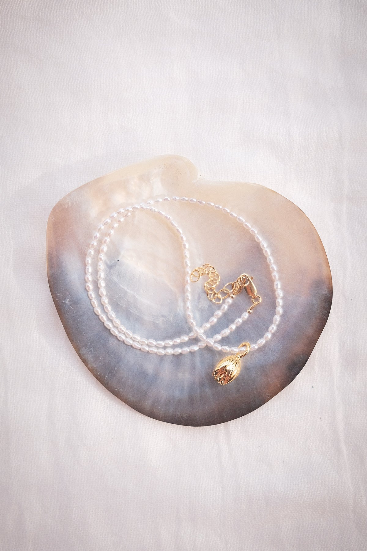 Tiny Pearl Strand Necklace with Pikake Pendant - Mikioi