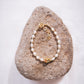 White Freshwater Pearl Bracelet with Gold Pikake Bead - Pōhina