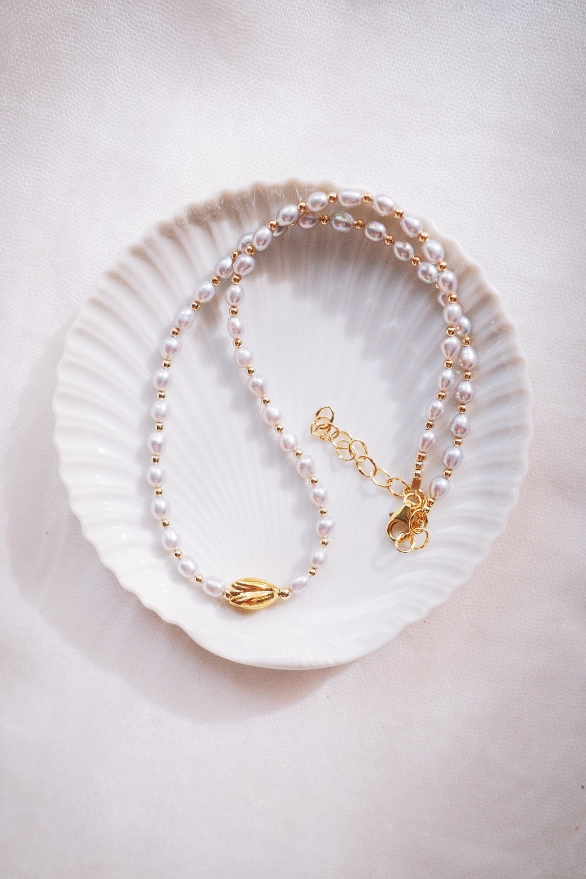 Gray Freshwater Pearl Necklace with Gold Pikake Bead - Hinahina