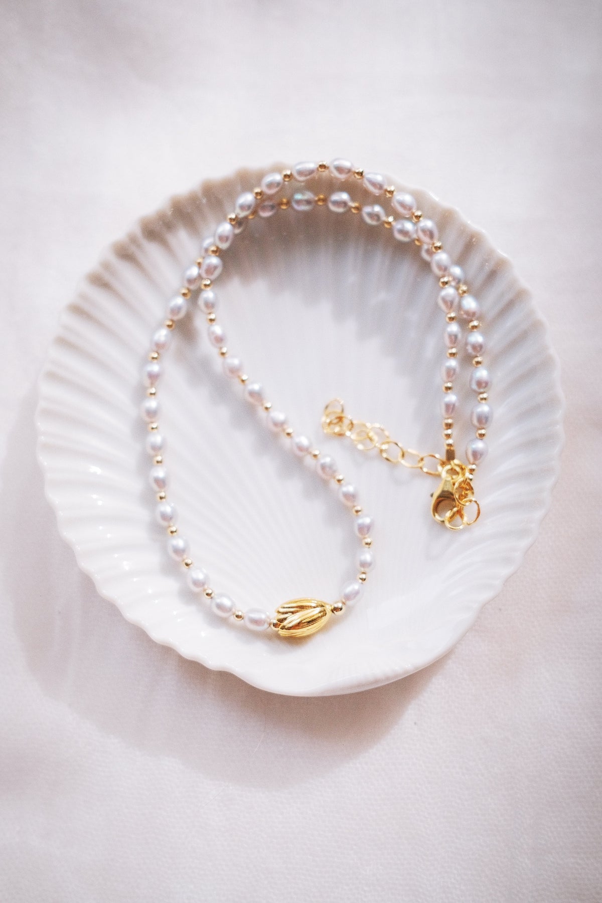 Gray Freshwater Pearl Necklace with Gold Pikake Bead - Hinahina